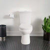 H2Option® Two-Piece Dual Flush 1.28 gpf/4.8 Lpf and 0.92 gpf/3.5 Lpf Standard Height Round Front Toilet With Liner Less Seat // WHITE // 260567_H2Option_EnvironmentCloseUp_2889518.020_0001_MARCH2024_CDNwebp.webp